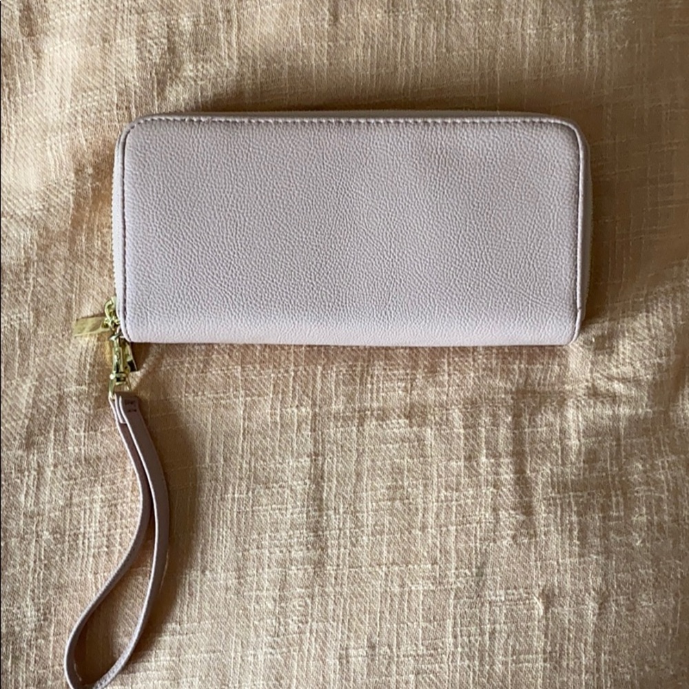 Light pink clutch with wristband